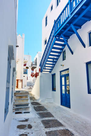 Street in Mykonos island in Greece on sunny summer day.  Greek architecture, cityscapeの写真素材
