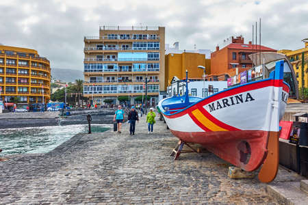 Puerto de la Cruz, Tenerife,  Spain - December 13, 2019: Waterftont with walking people in Puerto de la Cruz , The Canariesのeditorial素材