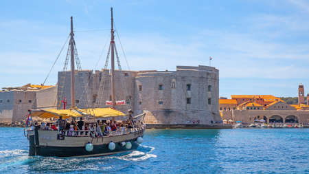 Dubrovnik, Croatia - Jine 12, 2017: Tourist ship going in the Old Port of Dubrovnikのeditorial素材