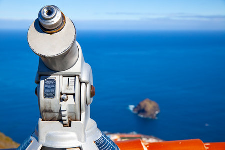 Garachico, Tenerife, Spain - January 26, 2017:  Tourist telescope at viewing point above Garachico and the Atlantic Oceanのeditorial素材
