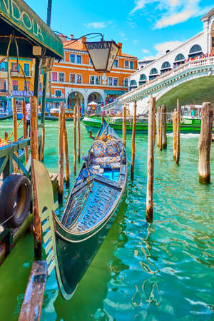 Venice, Italy  - June 15, 2018: Gondola on the Grand Canal next to Rialto bridge in Veniceのeditorial素材