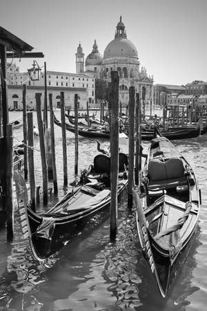 Gondolas on Grand Canal in Venice, Italy. Black and white venetian viewの写真素材