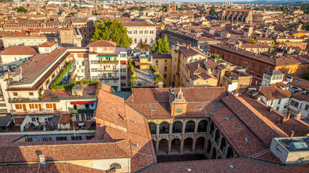 Tiled roofs of Bologna city, Italy. Panoramic view from above, italian cityscape