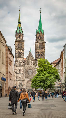 Nuremberg, Germany - May 17, 2016: Karolinenstrasse street with walking people and St. Lawrence church in Nurembergのeditorial素材