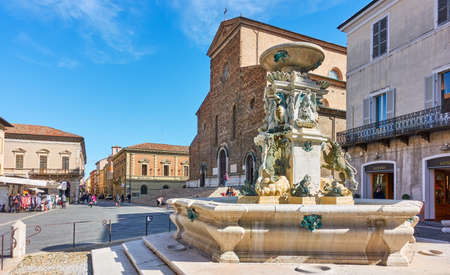 Faenza, Italy - February 27, 2020:  View of Liberta square in Faenza with Cathedral of Saint Peter the Apostle and fountain, Emilia-Romagna, Italyのeditorial素材