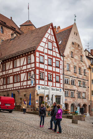 Nuremberg, Germany - May 17, 2016:  Street in the old town of Nuremberg with walking peopleのeditorial素材