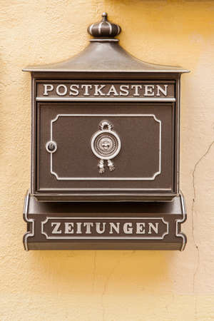 Nuremberg, Germany - May 17, 2016: German letterbox on the wall close-upのeditorial素材