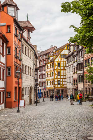 Nuremberg, Germany - May 17, 2016:  Street in the old town of Nuremberg with walking touristsのeditorial素材
