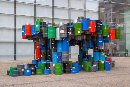 Nuremberg, Germany - May 17, 2016: - Contemporary sculpture of colorful empty oil barrels next to Neues Museum in Nurembergのeditorial素材