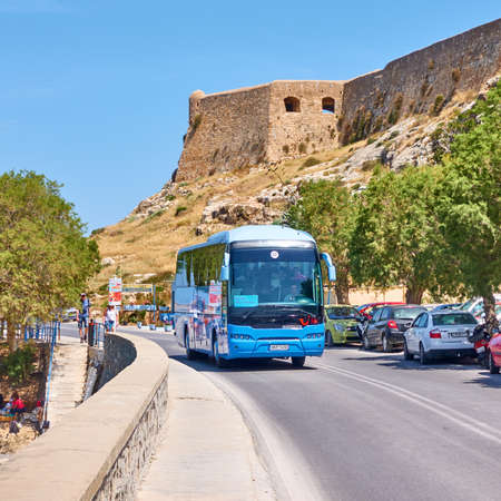 Rethimno, Crete Island, Greece - April 26, 2018: Tourist bus on the road in Rethimnoのeditorial素材