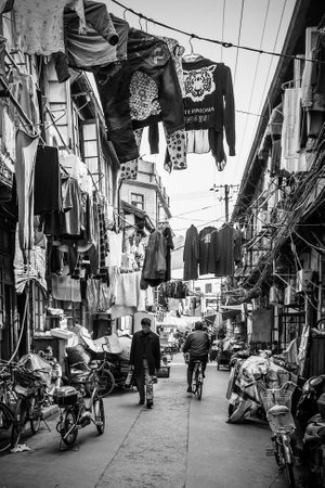 Shanghai, China - April 8, 2014: Old street in Shanghai city. Black and white urban photography, cityscapeのeditorial素材