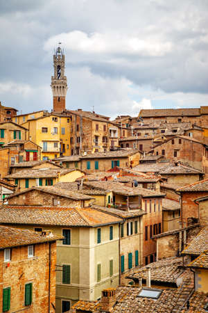 Tiled rooftops of the Old town of Siena, Tuscany, Italyの写真素材