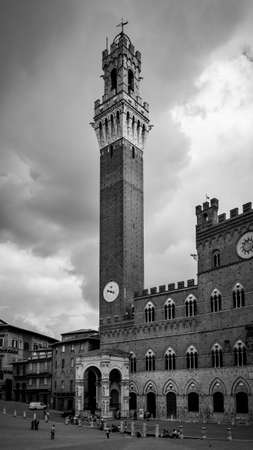 Mangia Tower in Siena, Italy. Black and white photographyの写真素材