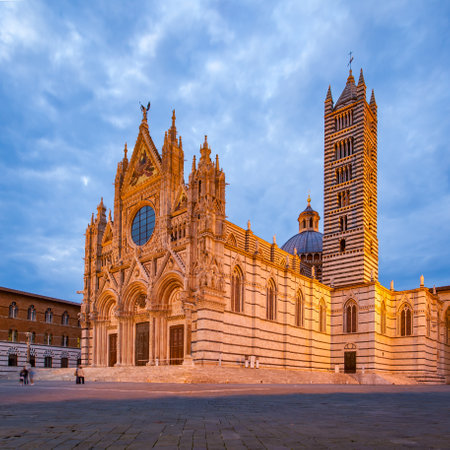 Siena Cathedral (Duomo di Siena) at dusk, Italyのeditorial素材
