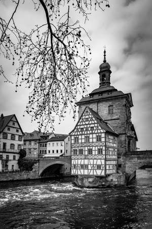 Landscape with city hall on the bridge in Bamberg, Germany. Black and white photographyの写真素材