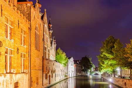 Canal in Bruges at night, Belgium. Cityscapeの写真素材
