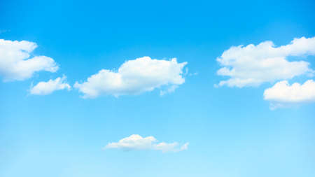 Idyllic blue sky with white clouds - background with copyspaceの写真素材