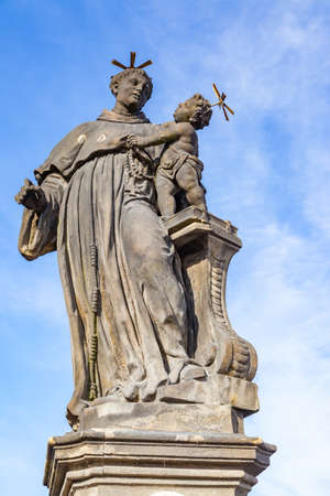 Statue of Anthony of Padua by Jan Oldrich Mayer (1707) on Charles Bridge in Prague, Czech Republicの写真素材
