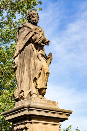 Statue of Jude the Apostle by Jan Oldrich Mayer (1708) on Charles Bridge in Prague, Czech Republicの写真素材