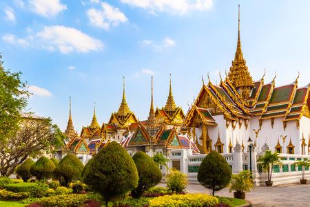 Garden and Phra Maha Prasat complex in The Royal Grand Palace, Bangkok, Thailandの写真素材