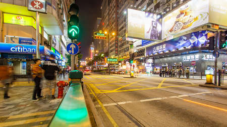 Hong Kong - December 13, 2010: Illuminated Nathan Road in Hong Kong city at nightのeditorial素材
