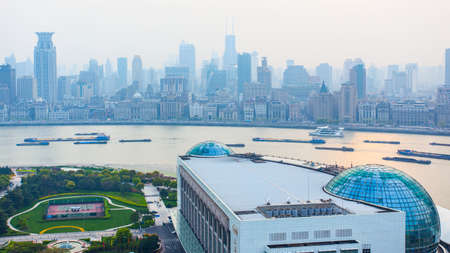 Shanghai, China - April 8, 2014: Panoramic view of Shanghai city with The Bund waterfront and Huangpu riverのeditorial素材