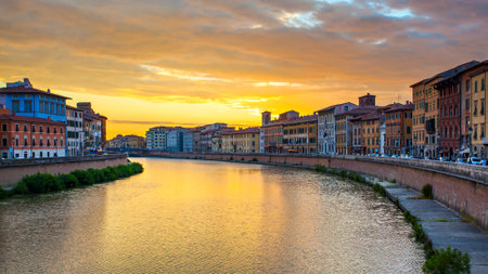Pisa, Italy - September 4, 2014: Panoramic view of The Old Town of Pisa at sunset with glowing skyのeditorial素材