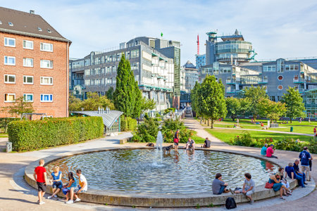 Hamburg, Germany - August 18, 2012:  People by fountain in public park in Hamburgのeditorial素材
