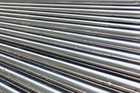 Chromized steel pipes - Industrial abstract backgroundの写真素材