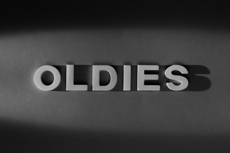 Oldies  - old movie style inscription. Black and white photographの写真素材