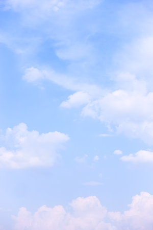 Bright blue sky with light clouds - vertical background, cloudscapeの写真素材