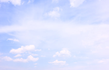 Bright blue sky with white clouds. Background, panoramic cloudscapeの写真素材