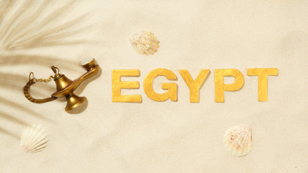 Egypt - Text and old magical oil lamp in the sandの写真素材