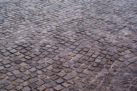 gray and wet paving slabs background and textureの写真素材