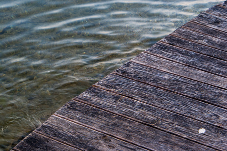 pier by mountains in the backgroundの写真素材