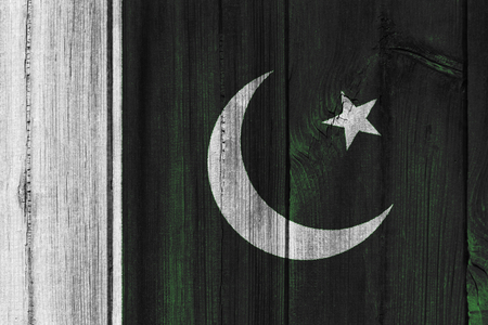 Pakistan  flag painted on wooden wall for background.の写真素材