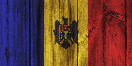 Moldova  flag painted on wooden wall for background.の写真素材
