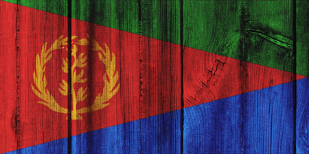Eritrea  flag painted on wooden wall for background.の写真素材