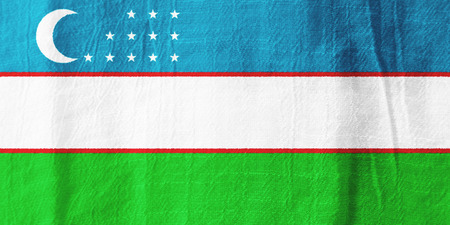 Uzbekistan national flag from fabric for graphic design.の写真素材