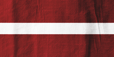 Latvia national flag from fabric for graphic design.の写真素材