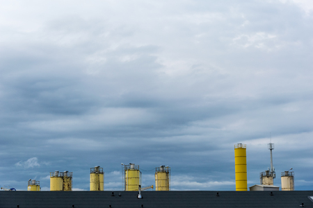 yellow storage silos in the city center.の写真素材