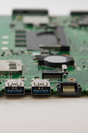 close up part of motherboard from laptop computer. USB and lan ports.