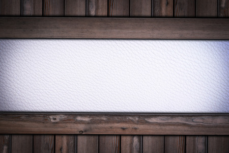 white leather texture pattern on wooden background.の写真素材
