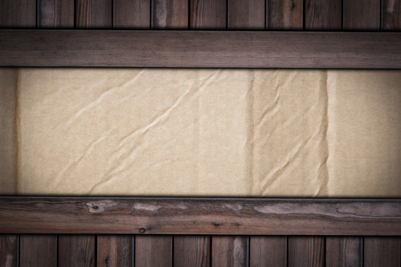 old cardboard texture on wooden background for graphic designers.の写真素材