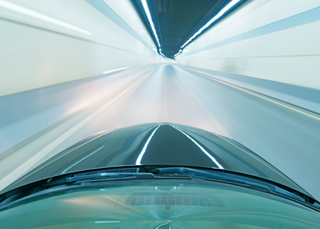 car on the road with motion blur backgroundの写真素材