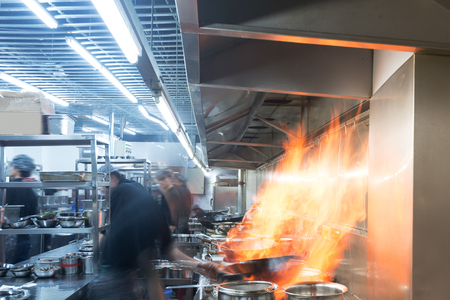 motion chefs of a restaurant kitchenのeditorial素材