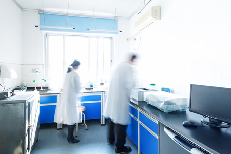 young researcher works in chemistry laboratoryの写真素材