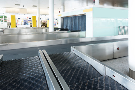 X-ray machine at the airport check-in counterの写真素材