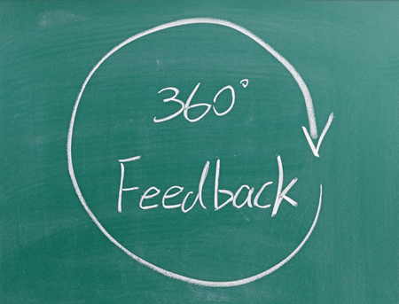 360 Degrees Feedback written on chalkboardの写真素材