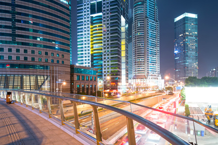 the light trails on the modern building background in shanghai china.